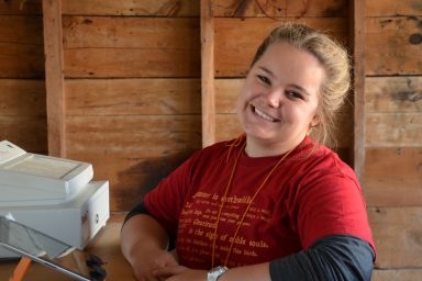 Smiling employee working at Treinen Farm Smiling employee working at Treinen Farm